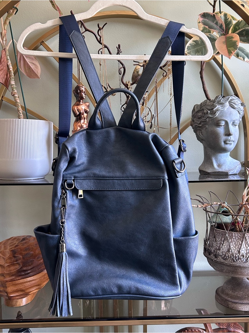Navy vegan leather travel backpack with blue tassel